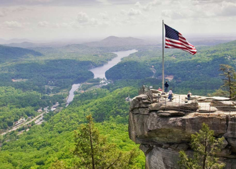 The American flag on the top of Chimney Rock 