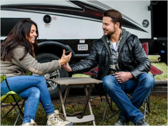 RVs and a Jeep at Maple Ridge RV Park sites