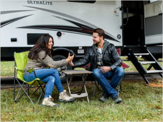 RVs and a Jeep at Maple Ridge RV Park sites