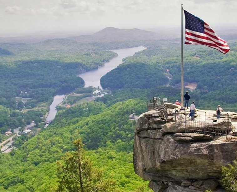 The American flag on the top of Chimney Rock 